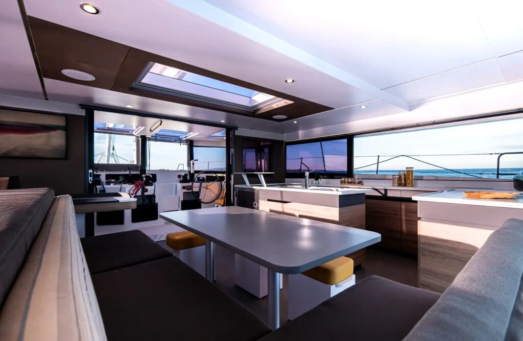 Windelo 54 open saloon with dining table and galley island